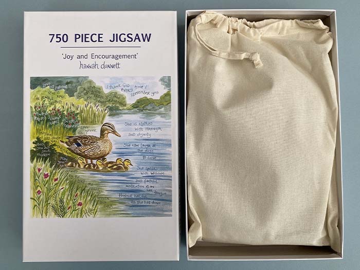 Hannah Dunnett Joy and Encouragement Jigsaw box and bag image